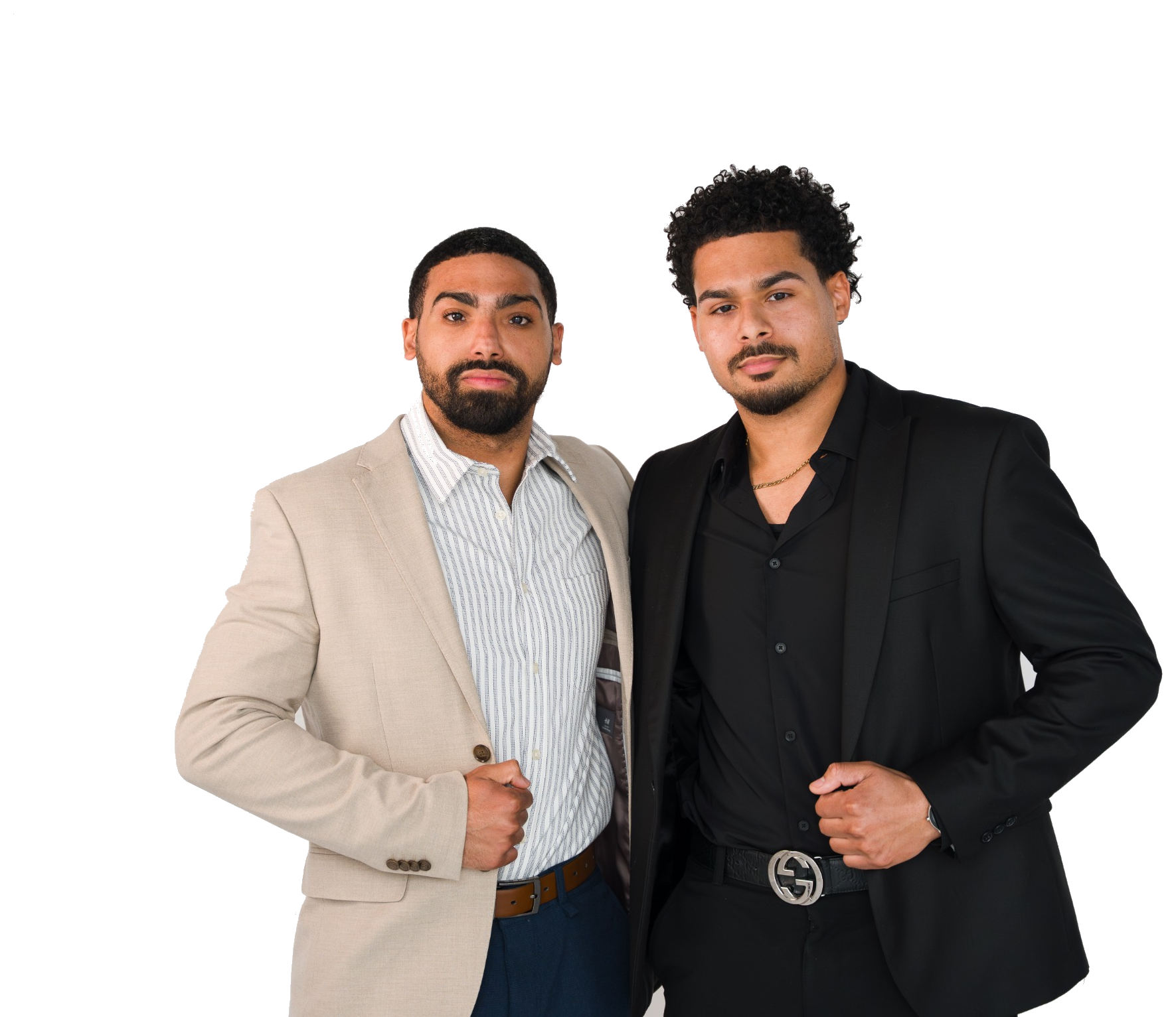 Nate and Zach Sims, founders of SimsBros Moving & Logistics, standing in professional business attire.